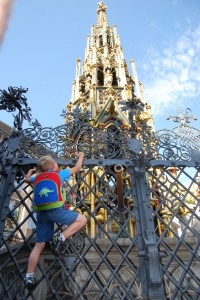James is spinning the mythical (and touristy) brass ring in the fence - make a wish!